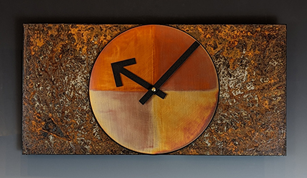 rusted steel and copper wall clock